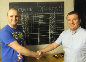 Team captains David Clorley and Paul Moss with the scoreboard