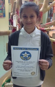 Annya Panhania with her certificate