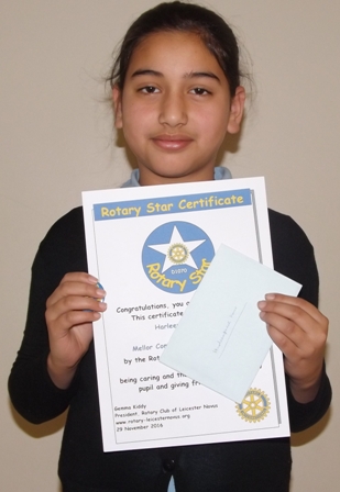 Harlanpreet Kaur, winner of a £5 gift voucher for being caring and thoughtful towards a new pupil and giving friendly support