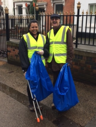 Anoushka Jethwa and Jim Matthews with litter-picker devices