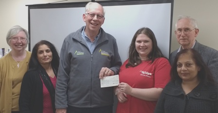 Paul Bonnett receives a cheque for the Air Ambulance from President Gemma and members