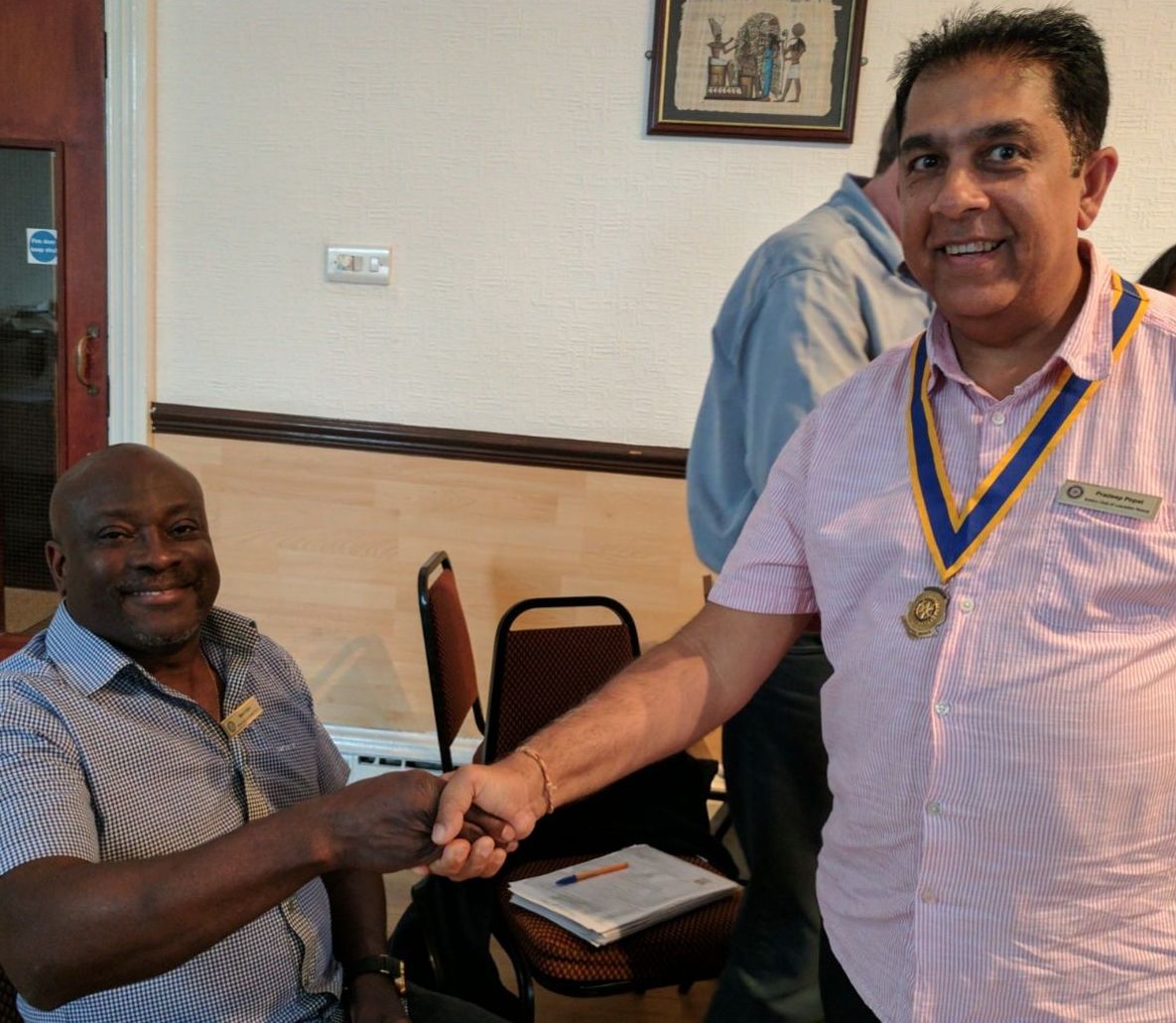 New President Pradeep welcomes new member Mark