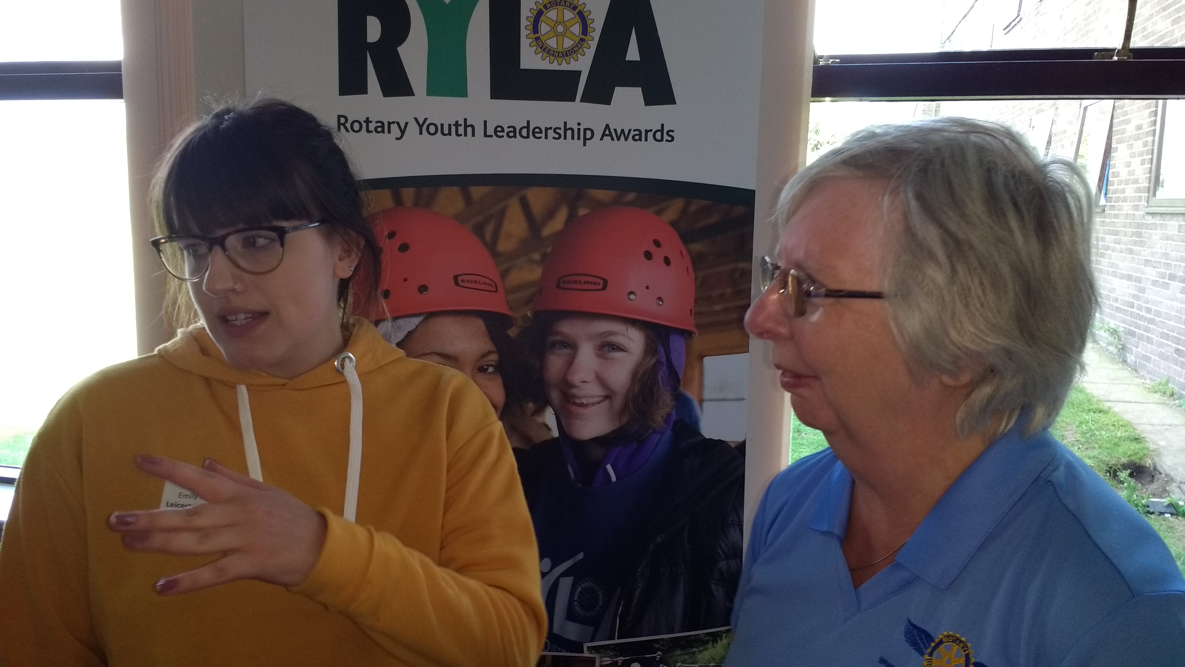 RYLA candidate Emily York chatting with Pam Spokes, of her sponsoring Rotary Club of Leicester Novus