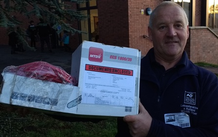 Keith Campbell, from Leicestershire and Rutland Wildlife Trust with a chain saw donated by Novus Rotary member Adrian McGreevy