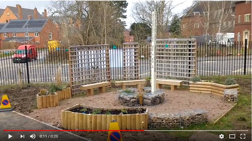 A central feature of the Peace Garden is the Peace Pole and the water feature surrounded by trellises and seats