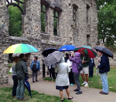 Umbrellas up as Rotary starts its tour of Abbey Park