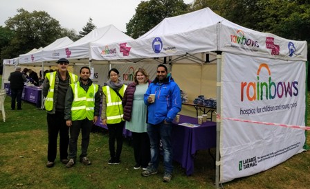 Job done. The Novus volunteers in front of some of the gazebos they helped erect