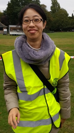 Mai Tsumura on duty wearing her Rotary Club of Leicester Novus hi-vis jacket