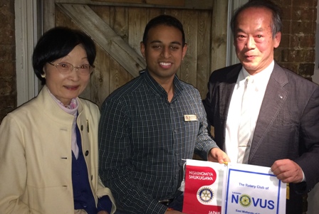 President Jason Chauhan exchanges banners with Rtn Shoji Yamamoto and his wife and Kazuko s