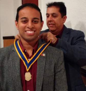 In with the new. President Jason Chauhan receives his president's jewel from outgoing poresident Pradeep Popat