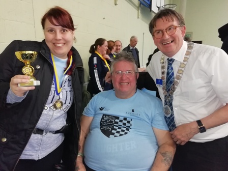 Winners Leatitia and Eddie after receiving their trophies from Rotary District Governor Tim Tucker